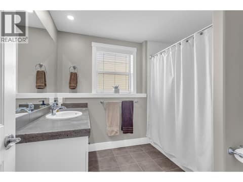 Bright downstairs bathroom at 2493 Ironridge Road, Smith Creek, West Kelowna