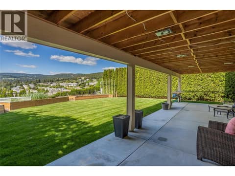 Cool covered lower patio at 2493 Ironridge Road, Smith Creek, West Kelowna