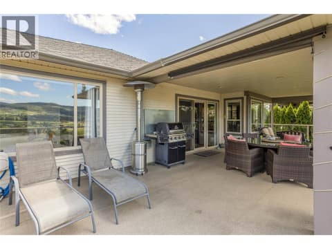 Covered and uncovered entertaining space at 2493 Ironridge Road, Smith Creek, West Kelowna