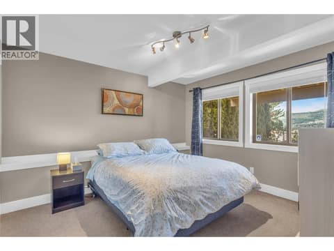 Second bedroom downstairs at 2493 Ironridge Road, Smith Creek, West Kelowna