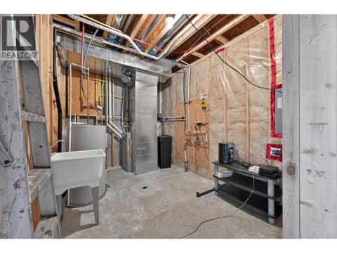 Mechanical Room with Large Sink at 1040 Mt Revelstoke Place Unit# 14 Lot# 20, Middleton Mountain Vernon