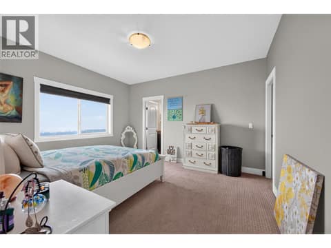 Spacious Primary Bedroom at 1040 Mt Revelstoke Place Unit# 14 Lot# 20, Middleton Mountain Vernon