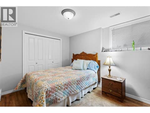 1st bedroom downstairs. at 4000 Gallaghers Terrace, South East Kelowna