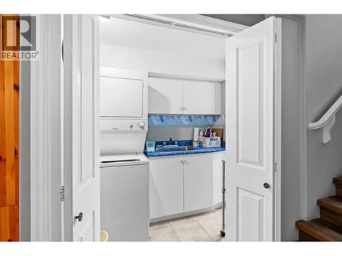 Downstairs laundry. at 4000 Gallaghers Terrace, South East Kelowna