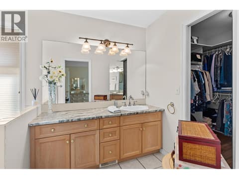 Large bathroom with walk in closet. at 4000 Gallaghers Terrace, South East Kelowna