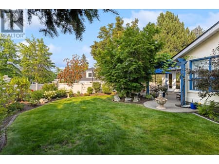 Large level fenced backyard. at 4000 Gallaghers Terrace, South East Kelowna