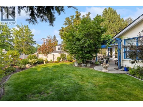 Large level fenced backyard. at 4000 Gallaghers Terrace, South East Kelowna