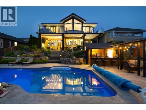 Pool and lake view at dusk at 10 Bayview Heights, Middleton Mountain Coldstream