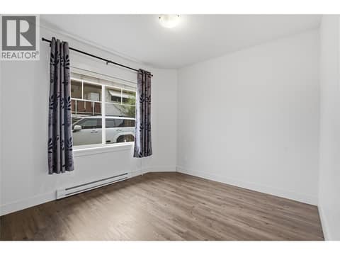 CARRIAGE HOUSE #2 BEDROOM 1 at 560 & 562 Christleton Avenue, Kelowna South