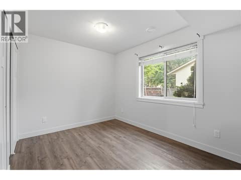 MAIN HOUSE #1 LOWER FLOOR BEDROOM 1 at 560 & 562 Christleton Avenue, Kelowna South