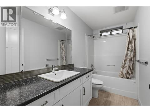 MAIN HOUSE #1 LOWER FLOOR BATHROOM 1 at 560 & 562 Christleton Avenue, Kelowna South
