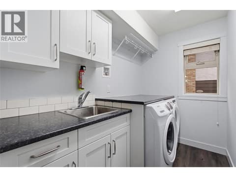 MAIN HOUSE # 1 LOWER FLOOR LAUNDRY ROOM at 560 & 562 Christleton Avenue, Kelowna South