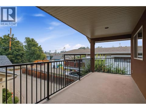 MAIN HOUSE #1 UPPER FLOOR COVERED DECK at 560 & 562 Christleton Avenue, Kelowna South