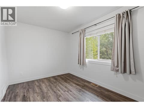 MAIN HOUSE #1 UPPER FLOOR BEDROOM 3 at 560 & 562 Christleton Avenue, Kelowna South