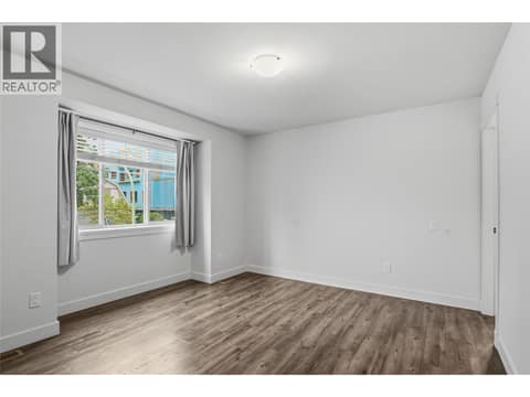 MAIN HOUSE #1 UPPER FLOOR MASTER BEDROOM 4 at 560 & 562 Christleton Avenue, Kelowna South