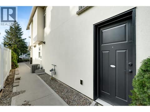MAIN HOUSE #1 MANDOOR INTO DOUBLE CAR GARAGE at 560 & 562 Christleton Avenue, Kelowna South