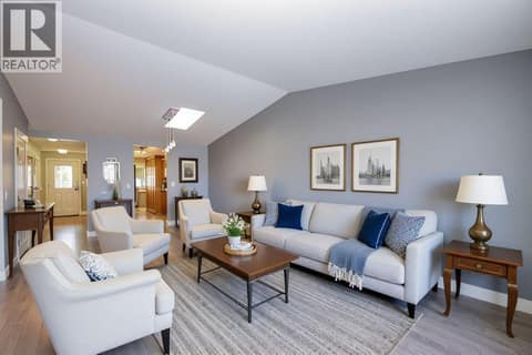 Living room is virtually staged at 1001 30 Avenue Unit# 30, East Hill, Vernon