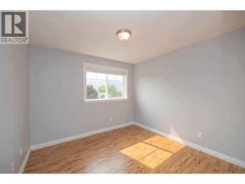 Third bedroom on main floor at 1808 Skyview Crescent, Lumby Valley