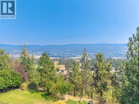 Beautiful East Facing Mountain Views with Golf Course below at 2233 Quail Run Drive, University District, Kelowna