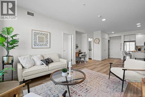 Living Room - Photos are of a similar home; some features may vary at 1057 Frost Road Unit# 305, Upper Mission, Kelowna