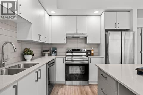 Kitchen. Photos may be of a similar home in the community. at 1057 Frost Road Unit# 118, Upper Mission, Kelowna