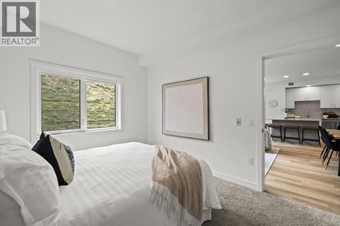 Second Bedroom. Photos may be of a similar home in the community. at 1057 Frost Road Unit# 118, Upper Mission, Kelowna