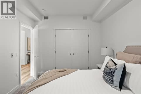 Second Bedroom. Photos may be of a similar home in the community. at 1057 Frost Road Unit# 118, Upper Mission, Kelowna