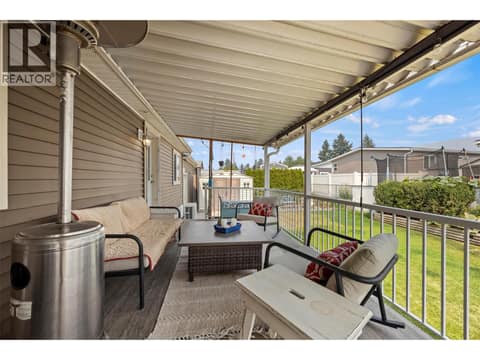 A second view of the expansive covered deck, offering a sheltered outdoor space to relax and enjoy throughout much of the year. at 9020 Jim Bailey Road Unit# 151, Lake Country East / Oyama, Kelowna