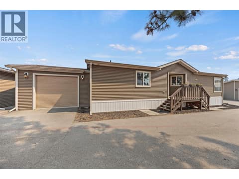 A valuable bonus: your own single garage provides secure parking plus additional storage, with convenient access just steps from the front door. at 9020 Jim Bailey Road Unit# 151, Lake Country East / Oyama, Kelowna