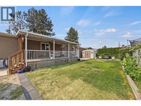 A wonderful bonus for this style of living: a generous, level grassy yard with plenty of room to garden, relax or enjoy with a pet. at 9020 Jim Bailey Road Unit# 151, Lake Country East / Oyama, Kelowna