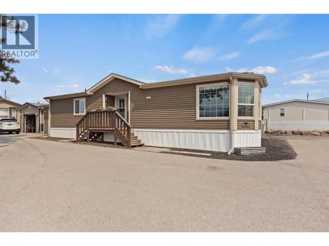 Attractive corner location with a bright bay window, generous parking and no shared walls, offering an appealing alternative to condo or apartment living. at 9020 Jim Bailey Road Unit# 151, Lake Country East / Oyama, Kelowna