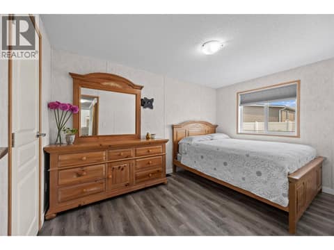 Comfortable second bedroom with plenty of room for a full bedroom suite, making it ideal for family, guests or a nursery. at 9020 Jim Bailey Road Unit# 151, Lake Country East / Oyama, Kelowna
