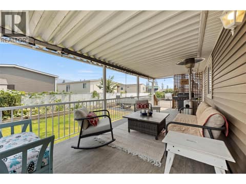 Fantastic covered deck extends the living space outdoors, with plenty of room for comfortable seating, dining and entertaining. at 9020 Jim Bailey Road Unit# 151, Lake Country East / Oyama, Kelowna