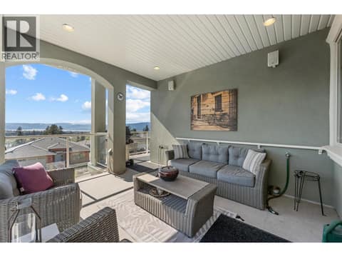 Covered Deck with lake and city views at 1095 Hume Avenue, Black Mountain, Kelowna