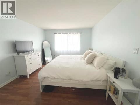 Master Bedroom with King Bed at 400 Sutton Crescent Unit# 310 Lot# 42, North Glenmore, Kelowna