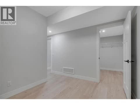 Downstairs Bedroom Closet at 1839 Grey Owl Court, McKinley Landing, Kelowna