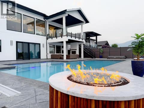 Enjoy the views of the inground swimming pool at 628 Hart Place, Foothills, Vernon