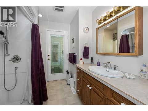 Ensuite with exterior door. at 2976 Heal Court, Armstrong/ Spall.