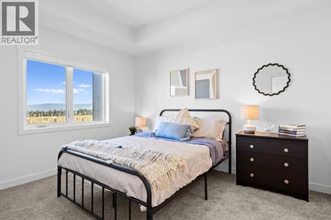 Bedroom - Photos are of a similar home; some features may vary at 1057 Frost Road Unit# 412, Upper Mission, Kelowna