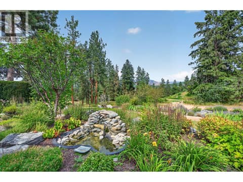 Parklike, with waterfall and pond - stunning views at 3901 Gallaghers Circle, South East Kelowna