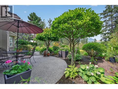 Side entry to rear yard at 3901 Gallaghers Circle, South East Kelowna