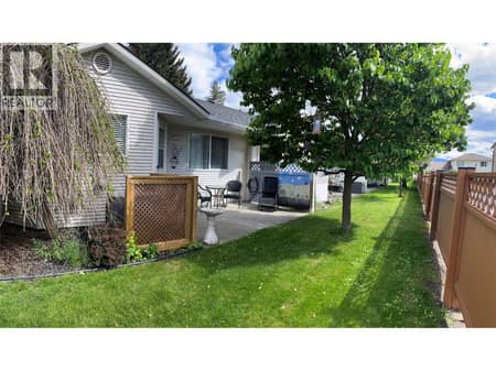 Backyard area has patio at 1902 46 Avenue Unit# 2, Harwood, Vernon