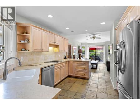 Kitchen with updated appliances. at 4400 Gallaghers Drive E Unit# 2, South East Kelowna