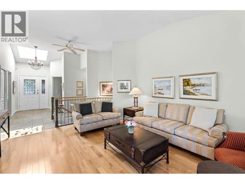 Living room looking back to front door and skylight. at 4400 Gallaghers Drive E Unit# 2, South East Kelowna