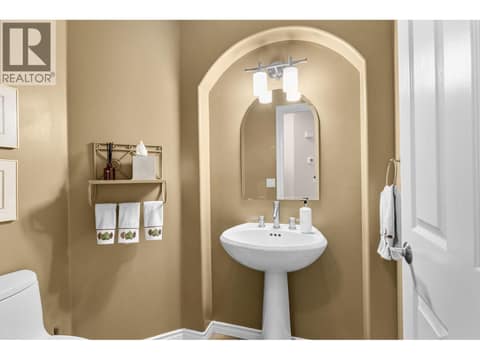 Main floor powder room. at 4400 Gallaghers Drive E Unit# 2, South East Kelowna