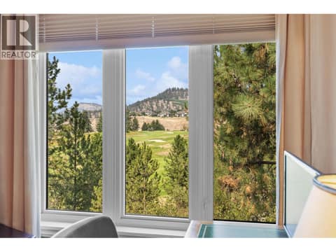 View of Pinnacle Golf Course from Primary Bedroom. at 4400 Gallaghers Drive E Unit# 2, South East Kelowna