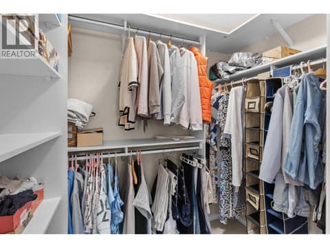 Walk in closet primary bedroom. at 4400 Gallaghers Drive E Unit# 2, South East Kelowna