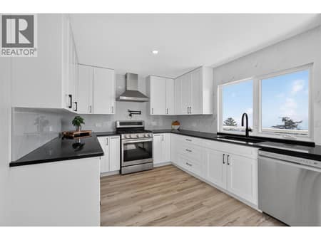 Fully renovated kitchen & updated appliances at 3491 Fenton Road, Glenrosa, West Kelowna