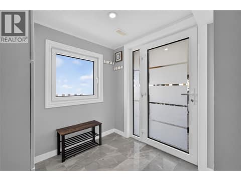 In-law suite/lower level entrance at 3491 Fenton Road, Glenrosa, West Kelowna