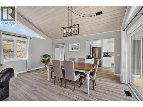 Open concept dining room at 3491 Fenton Road, Glenrosa, West Kelowna